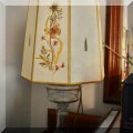 DL11. Concerted glass oil lamp with parchment pressed flowers shade. 